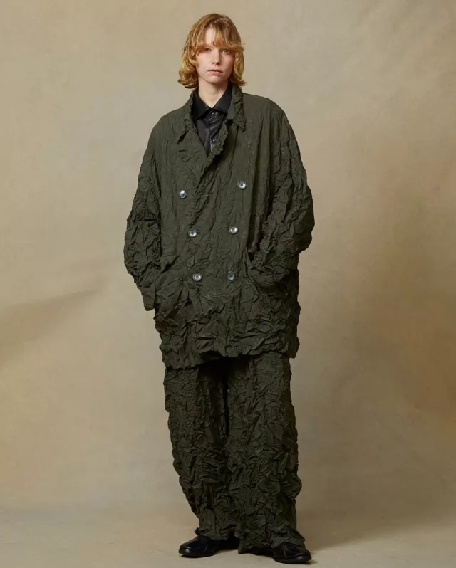 I originally covered designer Takaaki Shimase when he worked alone on his brand tac:tac. Now, he’s teamed up with pattern maker Kota Shimamura and repositioned his design profile to incorporate both sexes. Titled i’m here :, the duo is in their fourth season together and is looking to join the band of fellow androgynous JP brands. •A/W ’24 -Complete with a primarily monochrome and earthy color scheme, shades of green, brown, and blue fuse with a mix of materials like heavy cotton and structured wool in voluminous silhouettes. Overall, the styling emphasizes a modern and unisex approach, characterized by comfort and subtle design quirks that add a distinctive edge to otherwise straightforward pieces.•View more online••#imhere #orimonoplus